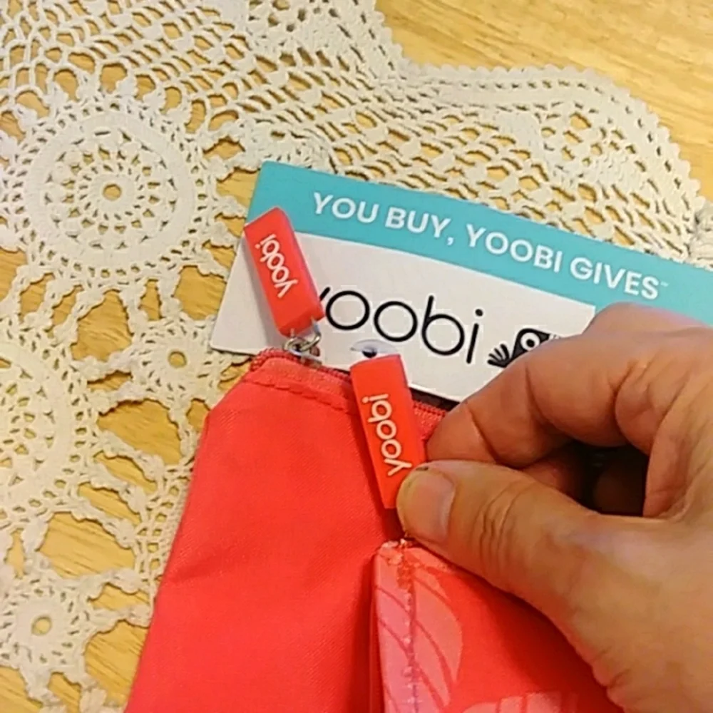 Yoobi bags, orange, for cosmetics, toiletries or whatever you want